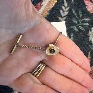 Men’s tie tack gold with black stone